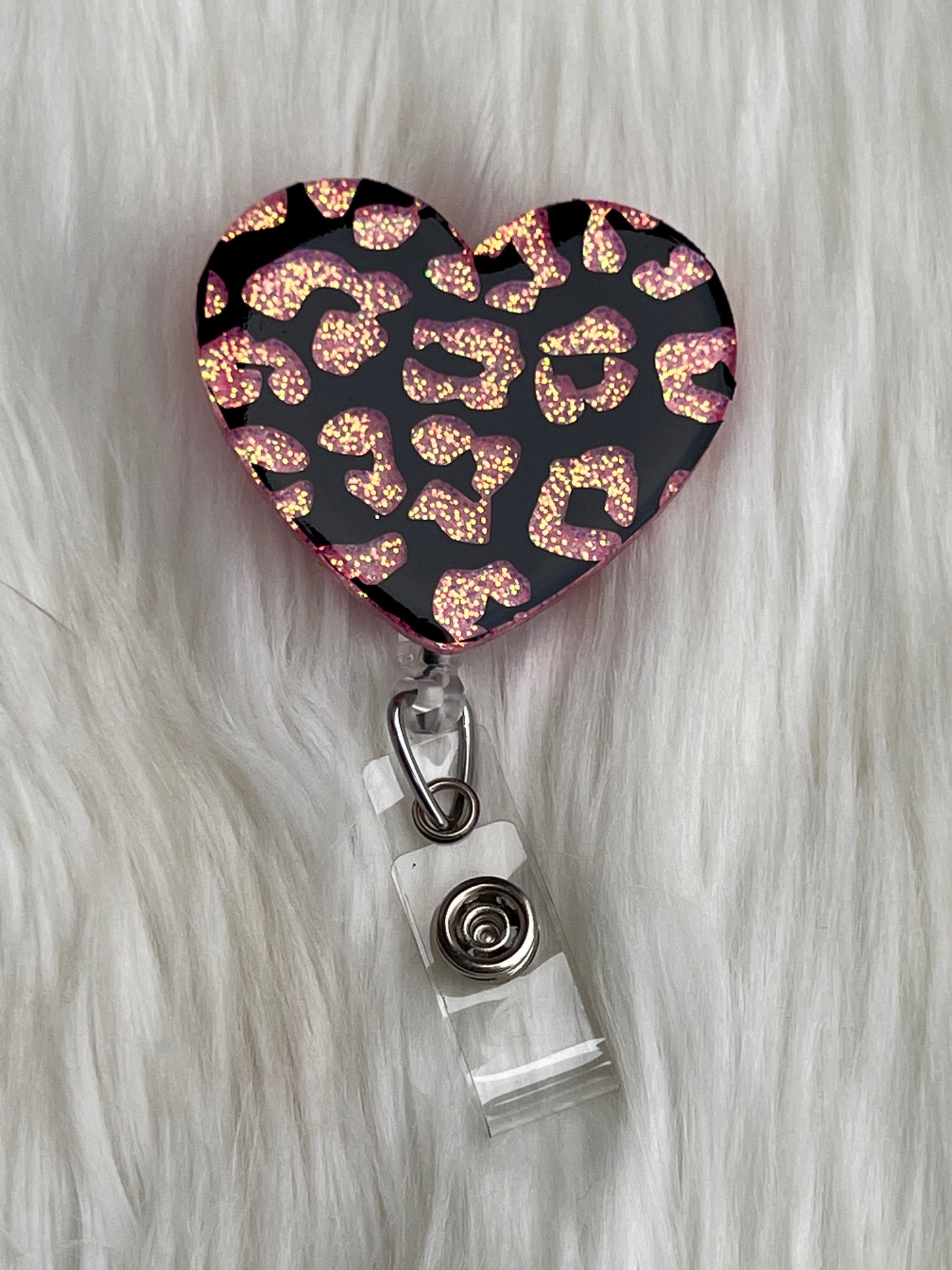 Pink heart badge reel