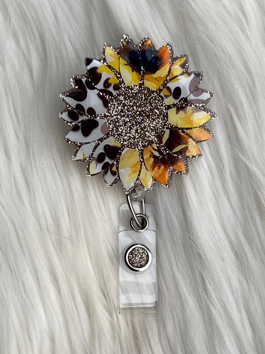 Paw print sunflower badge reel