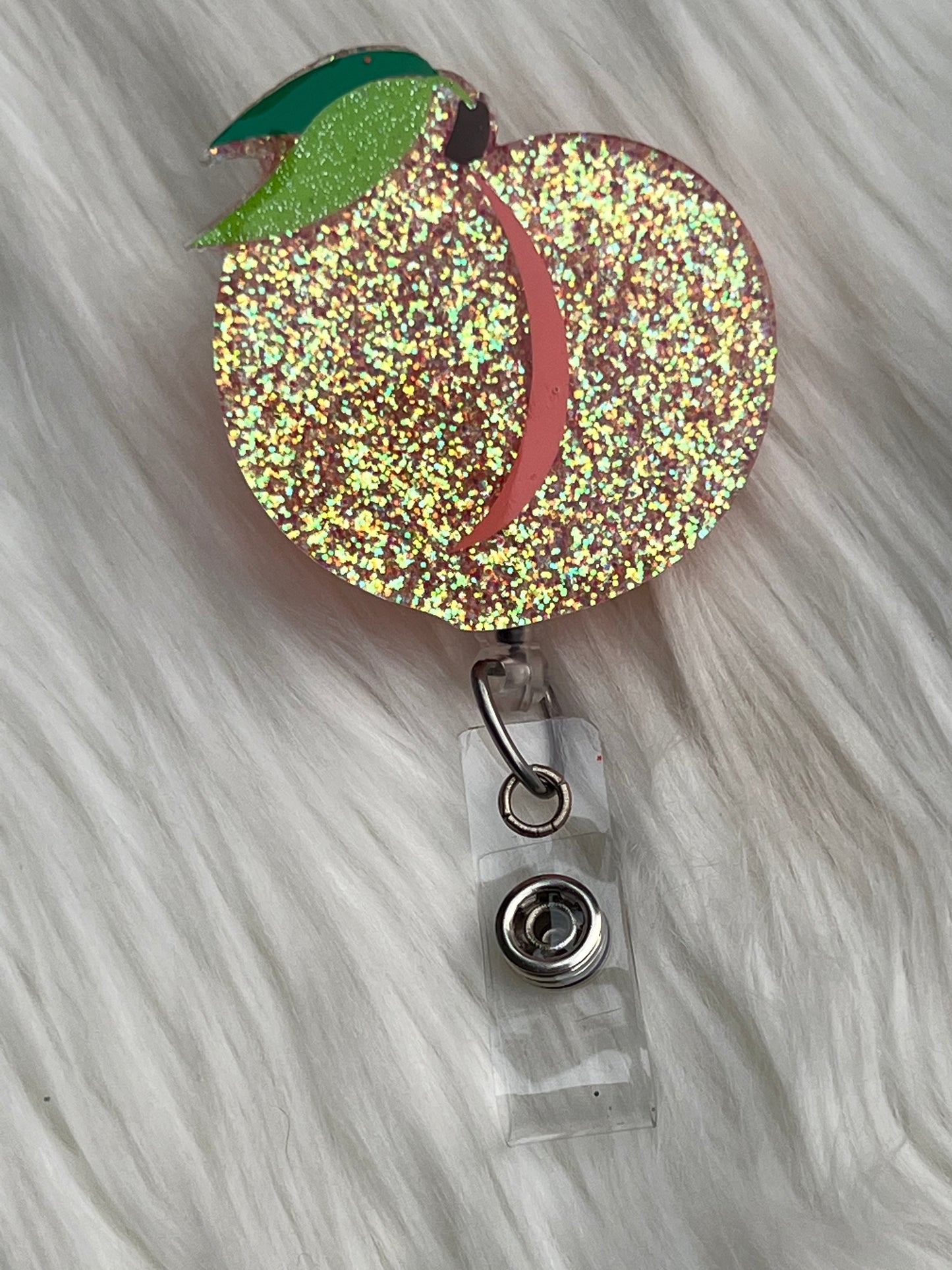 Peach badge reel